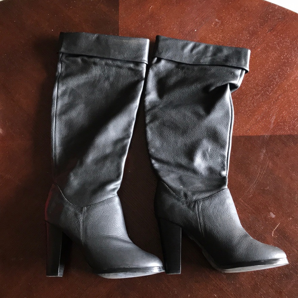 Tall black leather boot
